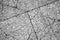 Cracked gray granite. Stone floor, flat texture