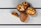 Cracked walnuts, nuts on shell on wooden table, top view image