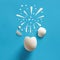 Cracked white chicken egg shell with fireworks symbol. Celebration, birthday, surprise concepts