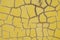 Cracked yellow paint wall