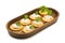 Cracker with tuna salad in a wooden tray