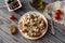 . Crackers with grated tomatoes, feta cheese, oregano, olives and olive oil