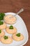 Crackers salmon pate and parsley on plate