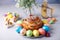 Craffin (Cruffin) with raisins and candied fruits sprinkled with powdered sugar. Traditional Easter Bread Kulich.