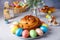 Craffin (Cruffin) with raisins and candied fruits. Traditional Easter Bread Kulich and painted eggs.