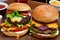 Craft burger is cooking on portrait background. Consist: sauce salsa, lettuce, red onion. Ai generated