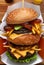 Craft burger is cooking on portrait background. Consist: sauce salsa, lettuce, red onion. Ai generated