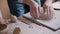 Craft person molding clay in small workshop studio