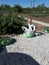 Craft from rubber tire - a white swan. Decorations in the garden