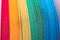 Craft supplies - tapes, paper rainbow colors, on white