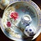 craft a visual representation of the delicate details in a piece of fine china trending on artst