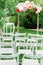 Crafted Elegance: Wedding Ceremony Venue with a Handmade Floral-Adorned Arch. Vertical photo orientation