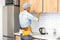 Craftsman carpenter at kitchen cabinet installation service work