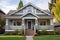 craftsman house featuring central gable with decorative gable vent