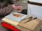 Craftsman makes handmade candy at a folk art fair