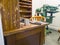 Craftsman\'s Corner: A Wooden Worktable with Tools and Containers