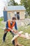 Craftsman working with circular saw