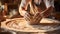 Craftsmans Expertise: Skillful Clay Vase Shaping on Pottery Wheel in Sunlit Studio