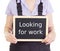 Craftsperson with blackboard: looking for work