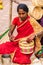 Craftswoman creating cane baskets