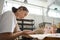 Craftswoman works with a special stack on a clay plate