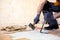 Crafty handyman removing old parquet