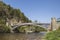 Craigellachie Bridge over the River Spey in Scotland.