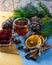 Cranberries in a glass plate. Frozen lingonberries in a glass plate on a wooden table.