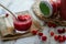 Cranberry marmelade  with fresh fruit on wooden background