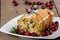 Cranberry walnut bread on a white plate