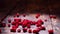 Cranberry on wooden background. Stock footage. Fresh red cranberries on the table. Healthy eating concept