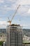 Crane constructing skyscraper