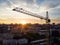 crane,construction cranes over building site silhouette with dramatic sky in the evening background,technology transportation