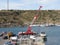 Crane at the harbour in Gozo, Malta