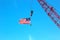 Crane Holding American Flag