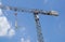 Crane lifting Pallet .Blue sky on background