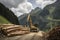 crane loading cut tree trunks on stack on mountain