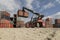 Crane picks up dry van containers, in Labuan Bajo, Indonesia