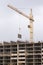 Crane raised formwork on construction of multi storey residential building