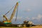 Crane ships working to repair the coastal vessels