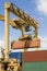 Cranes And Cargo Containers At Dock