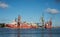 Cranes, ships mooring and industrial buildings in Gdansk shipyard