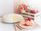 Crape cake pour with strawberry sauce