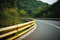 crash barrier on a curvy highway road