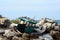 Crashed boat in rocks