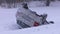 Crashed Car Upside Down on the Roof After an Accident on Winter Road With Snow.