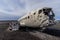 Crashed US army plane on black sand beach in Iceland