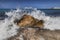 Crashing wave on a Greek beach