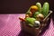 Crate of fruits and vegetables with zucchinim, chayote, tangerine, carrot, cucumber, scarlet eggplant, onion and garlic