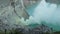 crater acid lake Kawah Ijen where sulfur is mined. Sulfur gas, smoke. mountain landscape Ijen volcano complex group of